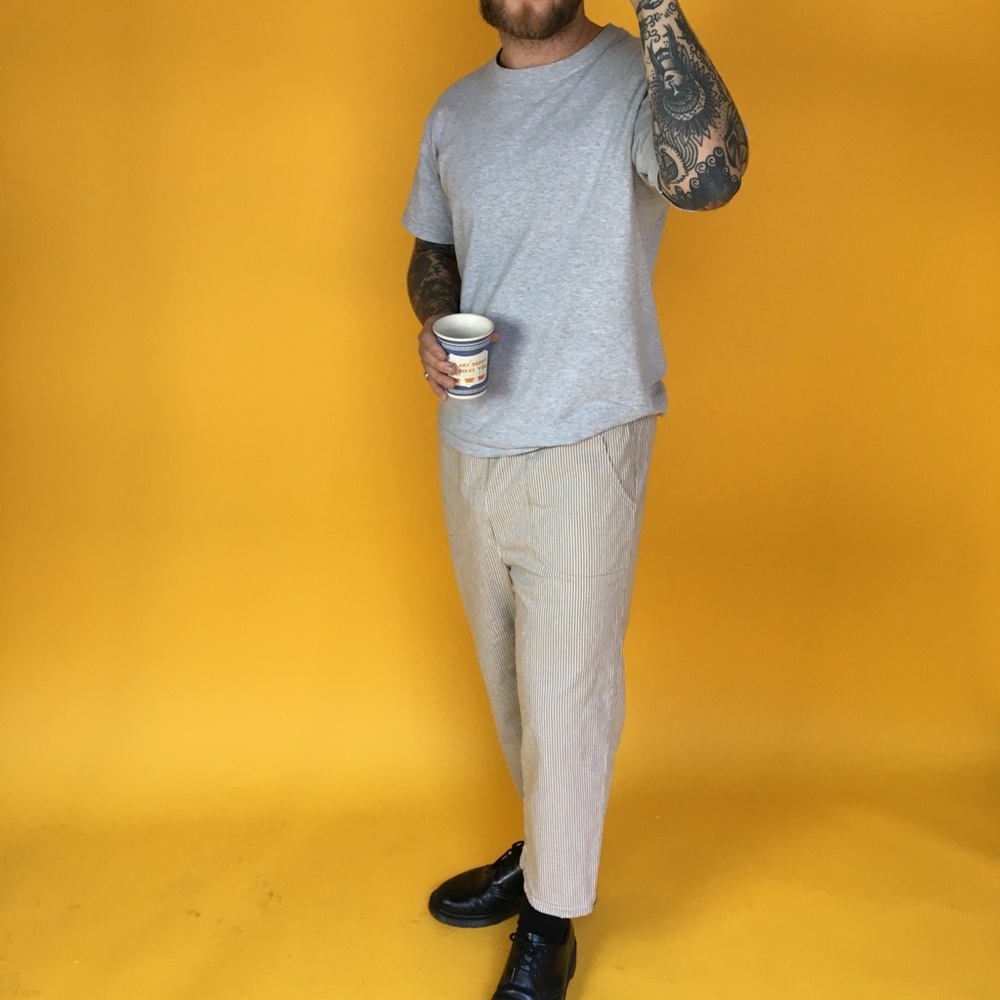 Unisex cropped beige and white pinstripe pants